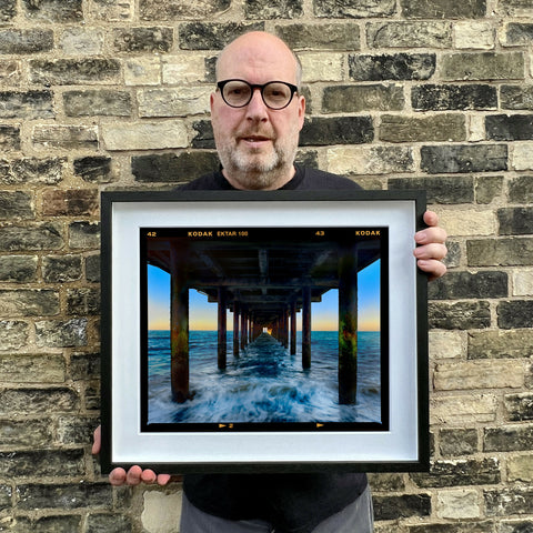 Richard holding Southwold Pier Landscape 445 Black Frame
