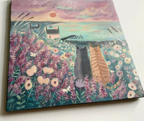 Coastal cats with cottage