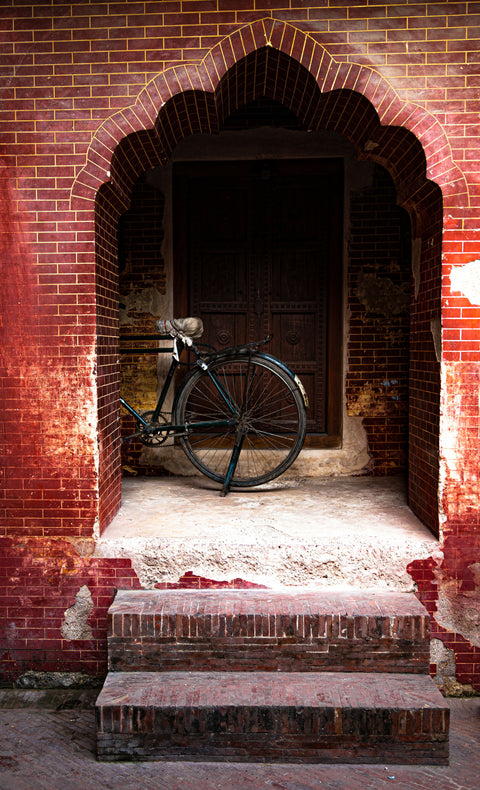 Bring it on home - Fatima Mian - Photography - Photographer - Photograph - Bike in archway - Pakistan - travel photography - Fine art photography - artist - art - buy photography