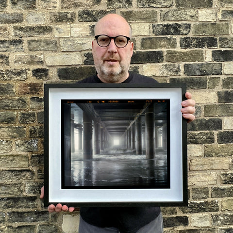 Richard holding Steel Pier Film Rebate 445 Black Frame