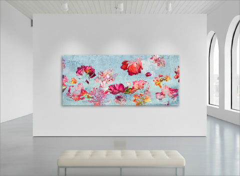 red and orange roses against a light blue background in an impressionistic style - floral wall art by wendy farrow in a gallery setting