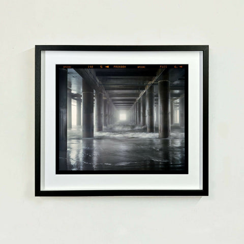 Steel Pier Film Rebate 445 Black Frame on the wall