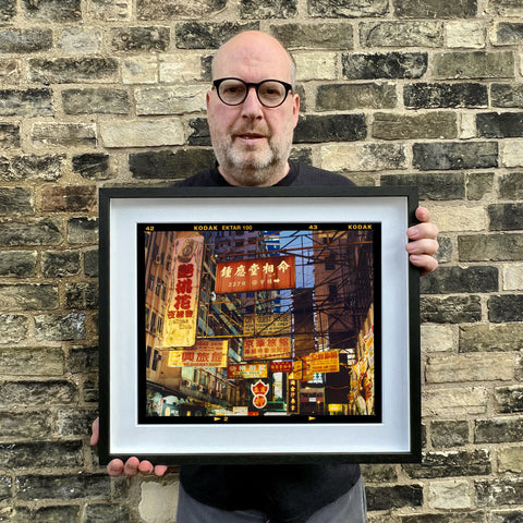 Richard holding Best Choice in Downtown Landscape 445 Black Frame