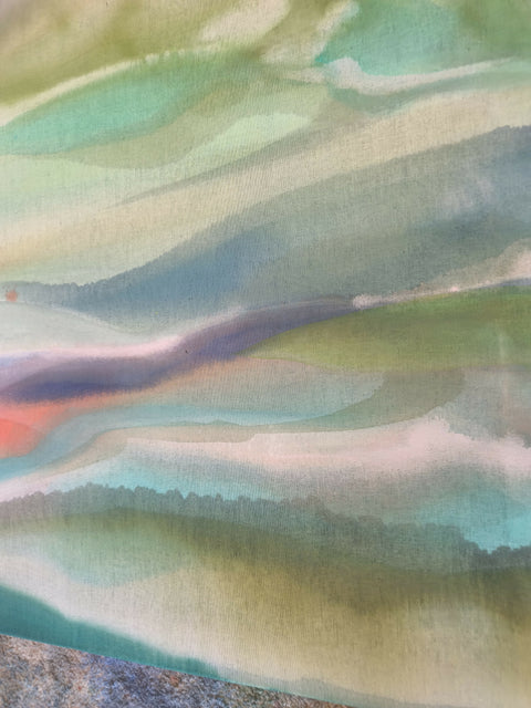 Rainbow behind the clouds of a storm