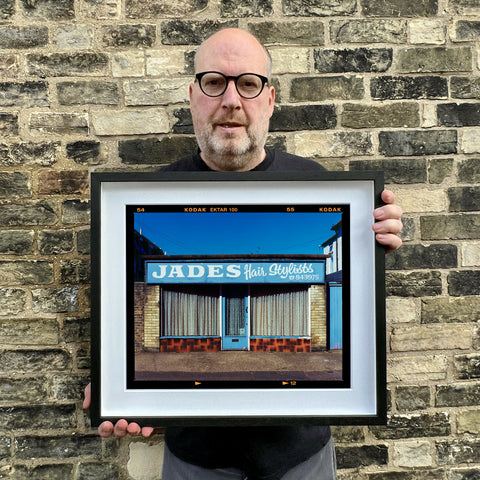 Richard holding JADES Landscape 445 Black Frame
