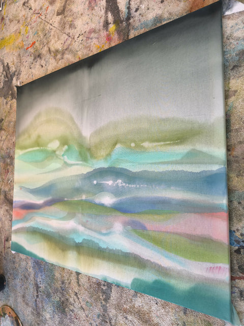 Rainbow behind the clouds of a storm